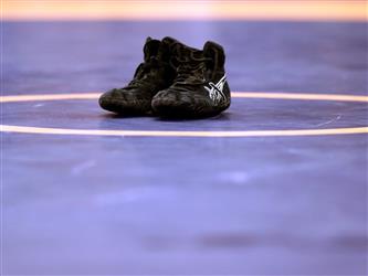 wrestling shoes on mat